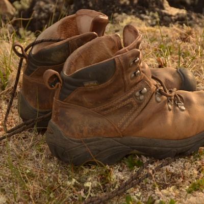 photo of a pair of hiking boots after a long trip